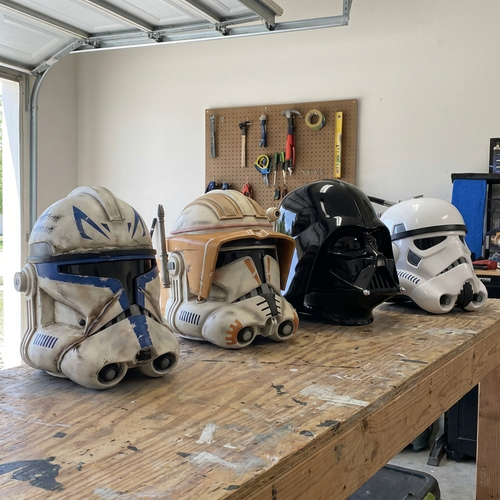 All four hand-painted resin display helmets