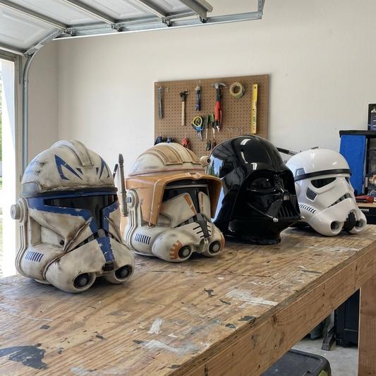 All four hand-painted resin display helmets